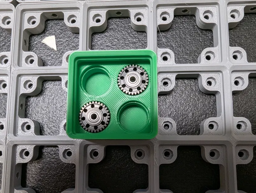 Khay đựng bánh răng máy đùn Creality K2 Plus chuẩn Gridfinity - Image 1