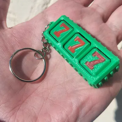 Móc Khóa Fidget Máy Quay Số May Mắn – Đồ Chơi Xoay Cầm Tay Độc Đáo