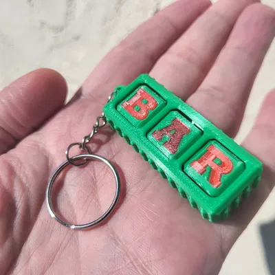 Móc Khóa Fidget Máy Quay Số May Mắn – Đồ Chơi Xoay Cầm Tay Độc Đáo