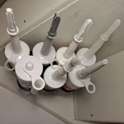 Giá treo ống keo 2 hàng gắn dưới kệ