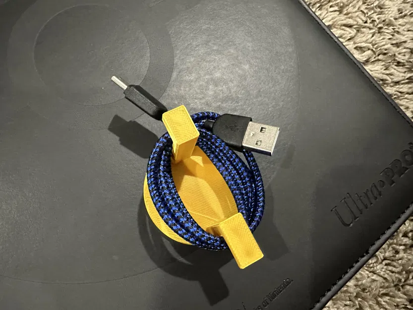 Dụng cụ quấn dây sạc (Charger Winder) nhỏ gọn tiện lợi - Image 1