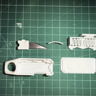 Móc khóa dao OTF sử dụng lưỡi X-Acto No.11