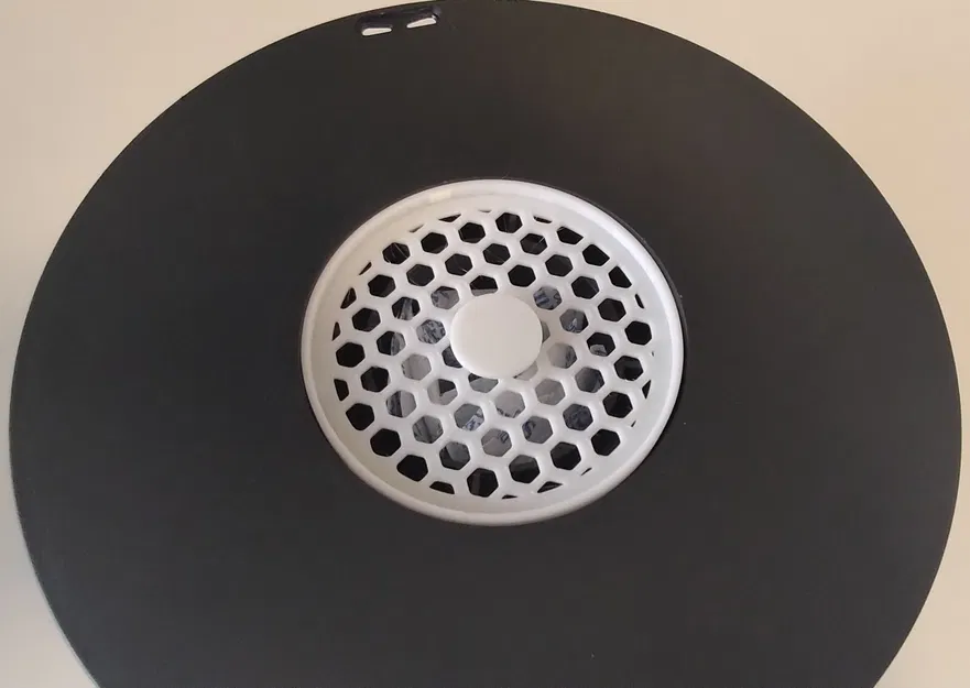 Bộ giá đỡ túi hút ẩm đặt trong cuộn nhựa (In-spool desiccant bag holder) - Image 2