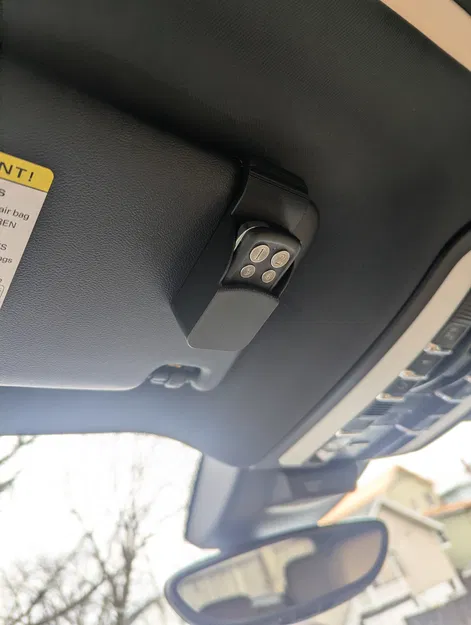 Giá đỡ remote cửa cuốn gắn tấm chắn nắng xe hơi - Image 2