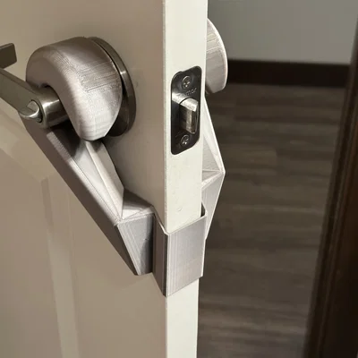 Khóa Chặn Tay Gạt Cửa