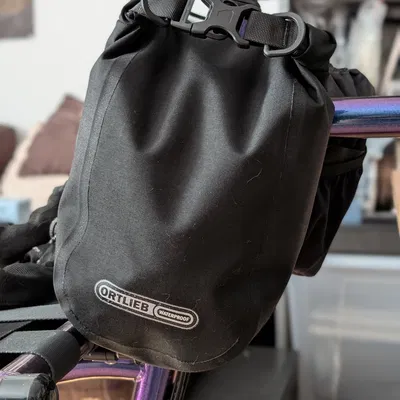 Ngàm gắn túi Ortlieb Outer-Pocket cho ống lái xe Omnium