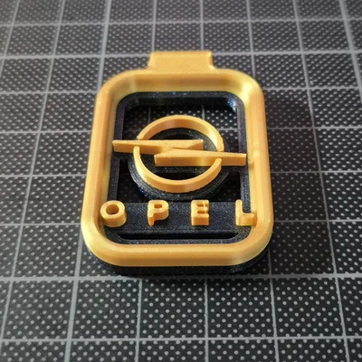Móc khóa logo Opel thiết kế rỗng in 3D độc đáo