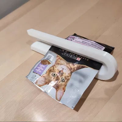 Dụng cụ nặn gói thức ăn cho mèo