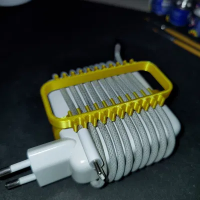 Phụ kiện quấn gọn dây sạc Macbook 67W in 3D