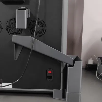 K2 Plus - Máng chứa rác thải bên trái kèm thùng có thể tháo rời