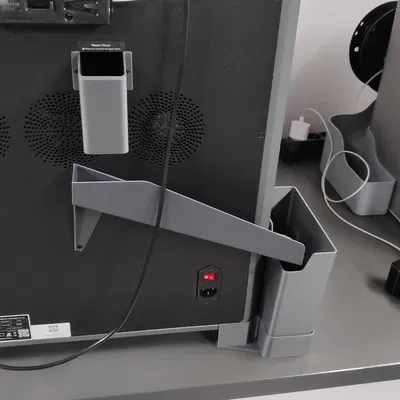 K2 Plus - Máng chứa rác thải bên trái kèm thùng có thể tháo rời