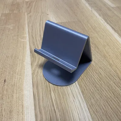 Đế giữ điện thoại và máy tính bảng có hỗ trợ sạc cáp