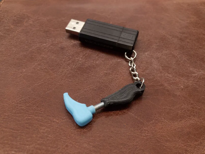 Móc khóa hình chân giả (Prosthetic leg keychain) - Image 1