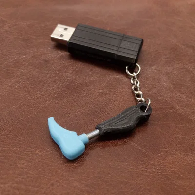 Móc khóa hình chân giả (Prosthetic leg keychain)