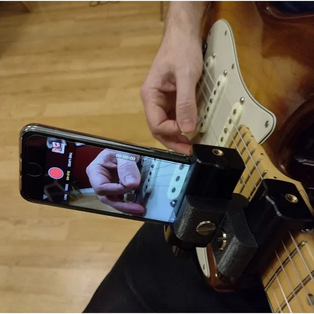 Ngàm gắn smartphone lên cần đàn Guitar - Image 1
