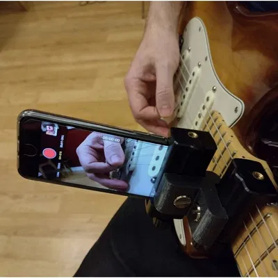 Ngàm gắn smartphone lên cần đàn Guitar