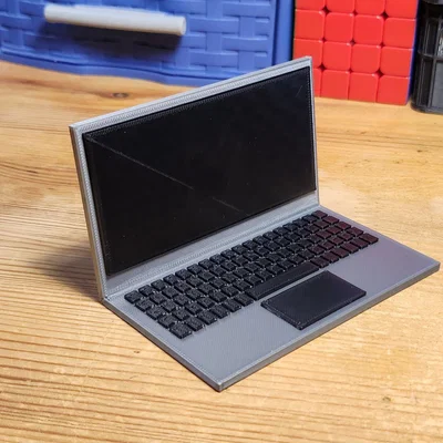 Laptop đồ chơi mini với khớp nối linh hoạt