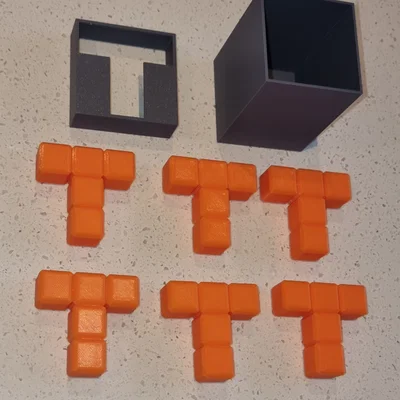 Mô hình giải đố T In The Box Puzzle