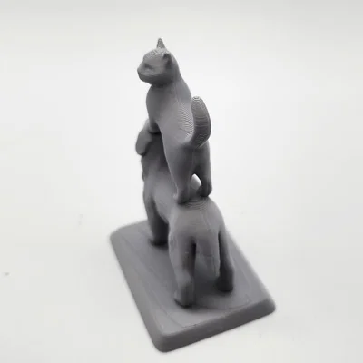 Mô hình Mèo đứng trên lưng Chó