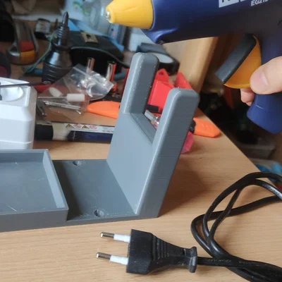 Giá đỡ súng bắn keo Rapid EG212 in 3D gọn gàng tiện lợi