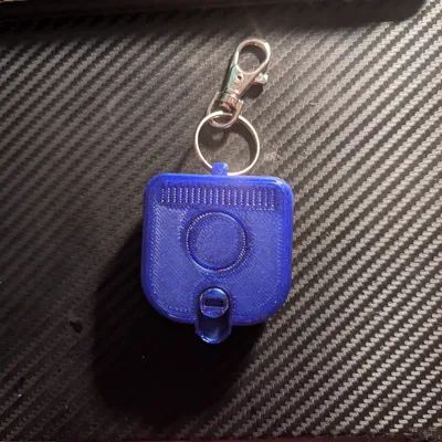 Hộp đựng nút tai Loop dạng móc khóa