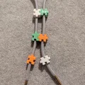 Kẹp dây áo hoodie hình mảnh ghép (Jigsaw Hoodie Beads) độc đáo - Thumbnail 1