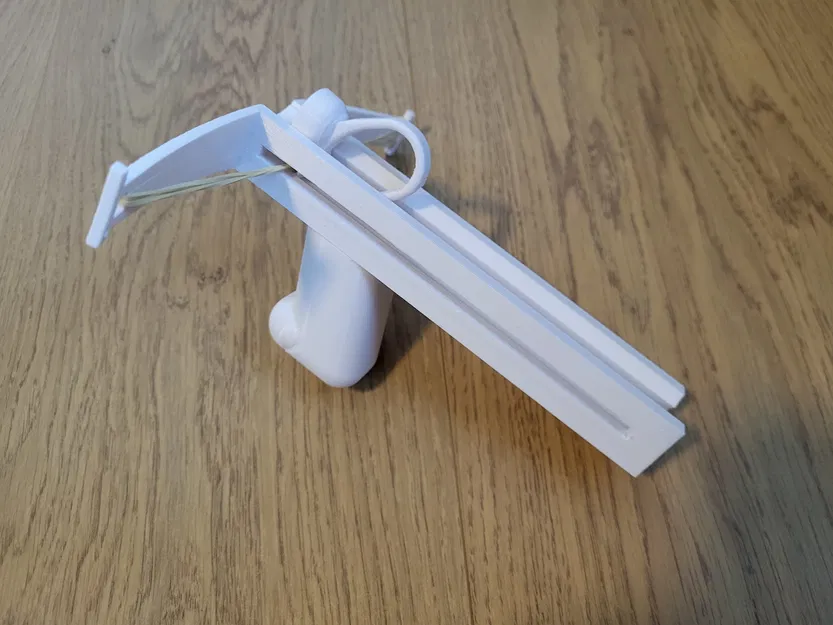 Nỏ Mini Để Bàn – Máy Bắn Cầu Giấy & Bánh Thưởng Cho Thú Cưng - Image 1