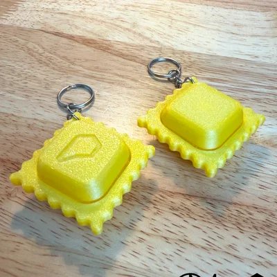 Móc khóa giảm stress hình bánh Ravioli Clicker độc đáo