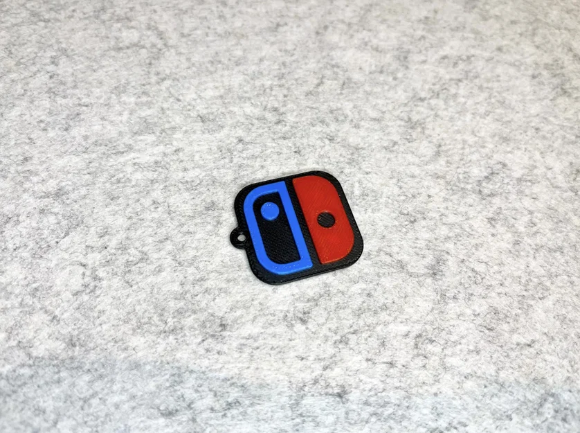 Móc khóa logo Nintendo Switch - Phụ kiện trang trí cho game thủ - Image 4