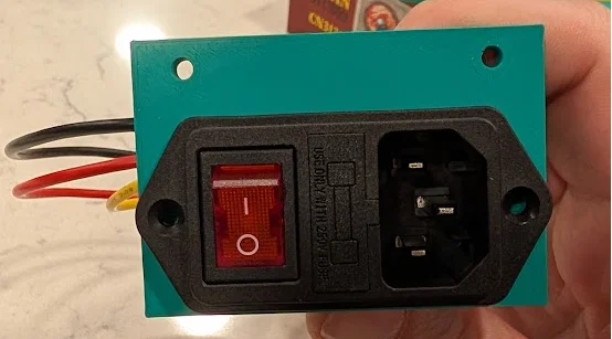 Giá đỡ ổ cắm nguồn có công tắc cho máy in Rook MK2 - Image 1