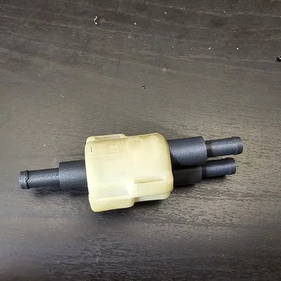 Bộ chia nước rửa kính: Chân van một chiều thay thế