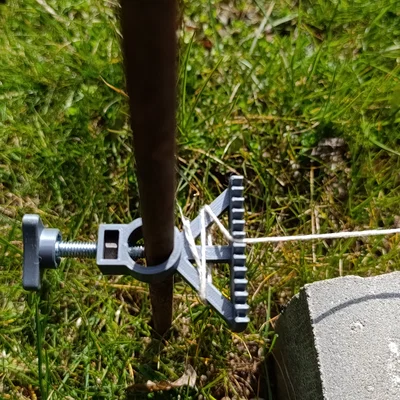 Dụng cụ giữ và cân chỉnh dây String line holder