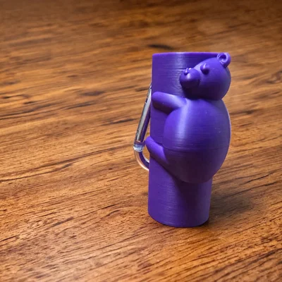 Móc khóa Gấu Teddy ôm son dưỡng môi