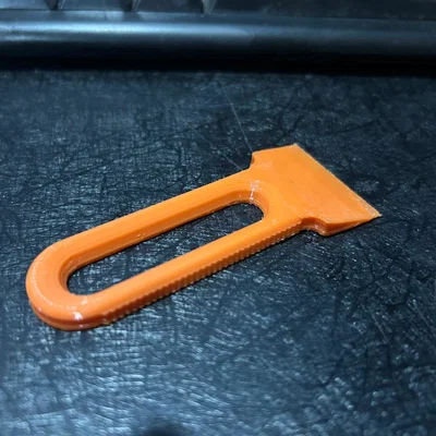 ErgoGrip Bed Scraper – Lưỡi Nạy Bàn In Góc Nghiêng + Tay Cầm Vân Nhám (Không Trầy Bàn)