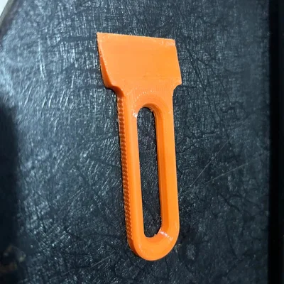 ErgoGrip Bed Scraper – Lưỡi Nạy Bàn In Góc Nghiêng + Tay Cầm Vân Nhám (Không Trầy Bàn)