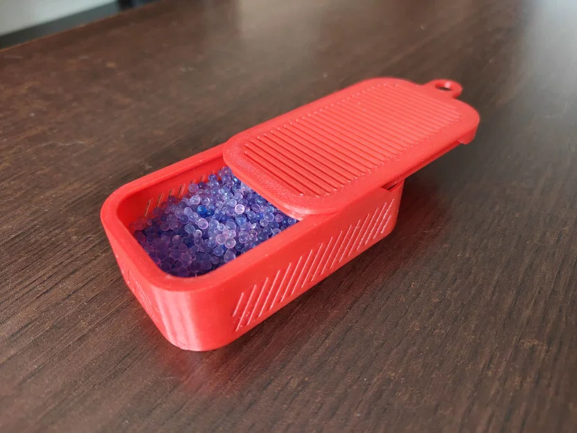 Hộp đựng hạt hút ẩm silica gel nhỏ gọn kèm ngàm gắn - Image 1