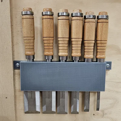 Giá treo đục (Chisel Holder)