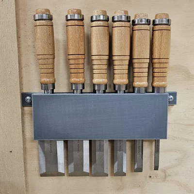 Giá treo đục (Chisel Holder)