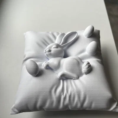 Mô hình thỏ Phục sinh đang ngủ trên gối