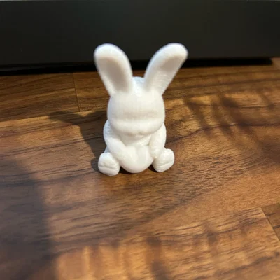 Mô hình in 3D chú thỏ đan len ôm trái tim dễ thương làm quà tặng