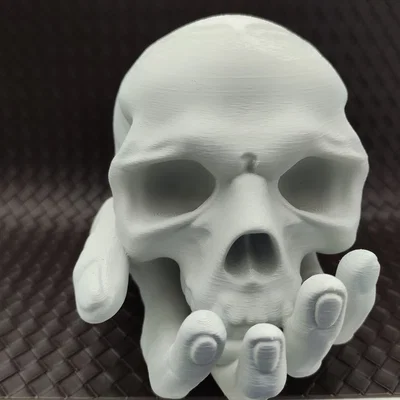 Skull in Hand - Ống heo/Heo đất hình đầu lâu trên bàn tay