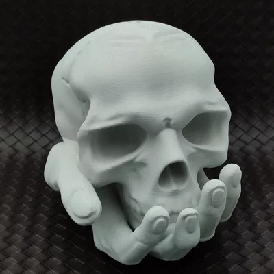 Skull in Hand - Ống heo/Heo đất hình đầu lâu trên bàn tay