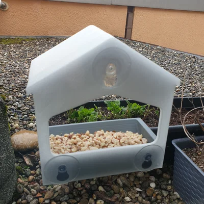 Khay cho chim ăn gắn cửa sổ với khay trượt tiện lợi