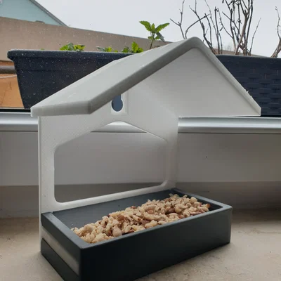 Khay cho chim ăn gắn cửa sổ với khay trượt tiện lợi