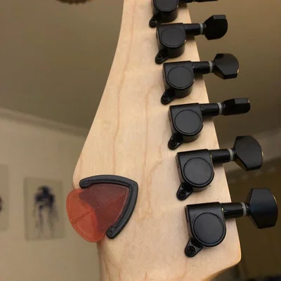 Bộ đế giữ phím và phím gảy dành cho đàn guitar!