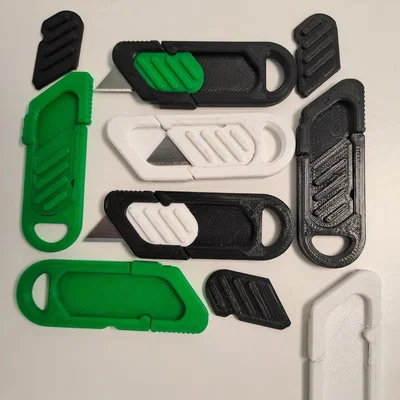 Móc khóa dao rọc giấy siêu nhỏ (Tiny utility knife keychain)