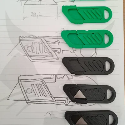 Móc khóa dao rọc giấy siêu nhỏ (Tiny utility knife keychain)