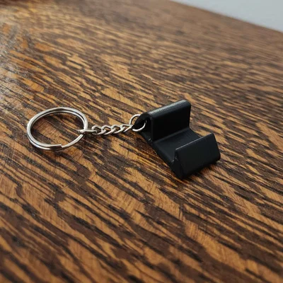 Móc khóa kiêm đế đỡ điện thoại mini