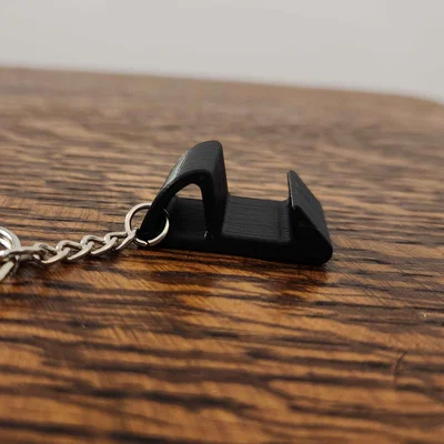 Móc khóa kiêm đế đỡ điện thoại mini