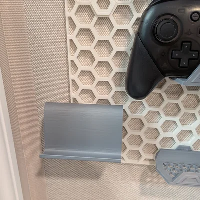 Giá treo hộp game Nintendo Switch cho Honeycomb Storage Wall